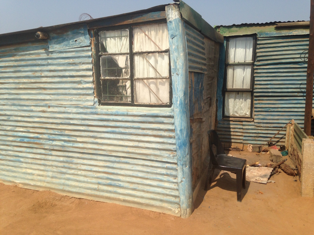 south africa tin hut living conditions